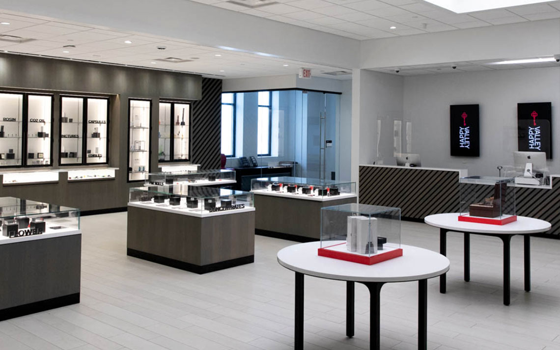 Happy Valley dispensary in Massachusetts features branded TVs to align with their store design
